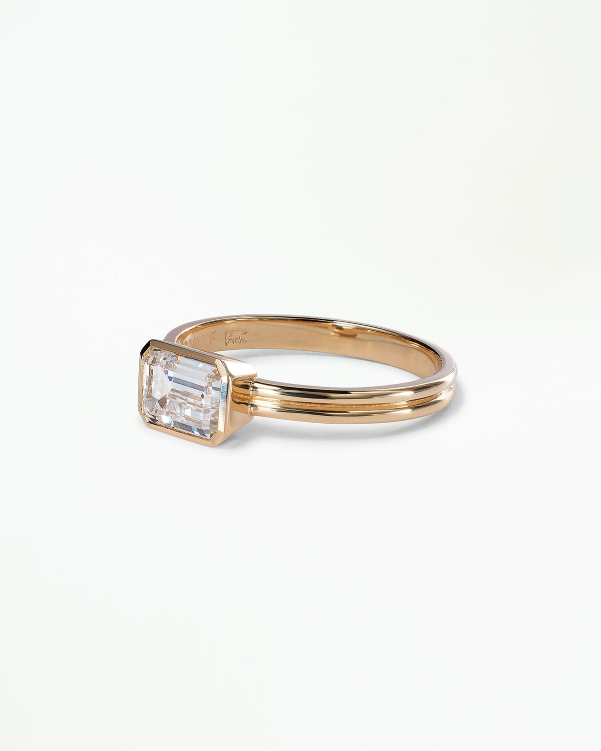 [lifestyle]Emerald Cut Diamond Ridge Solitaire Ring
