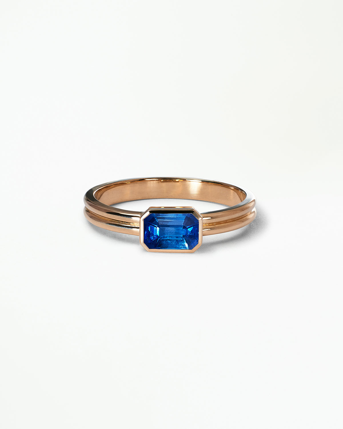 Emerald Cut Gemstone Ridge Solitaire Ring