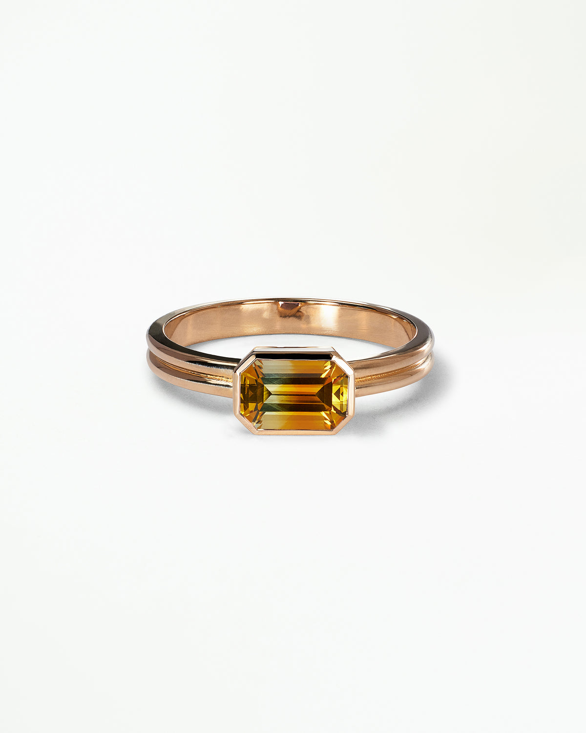 Emerald Cut Gemstone Ridge Solitaire Ring