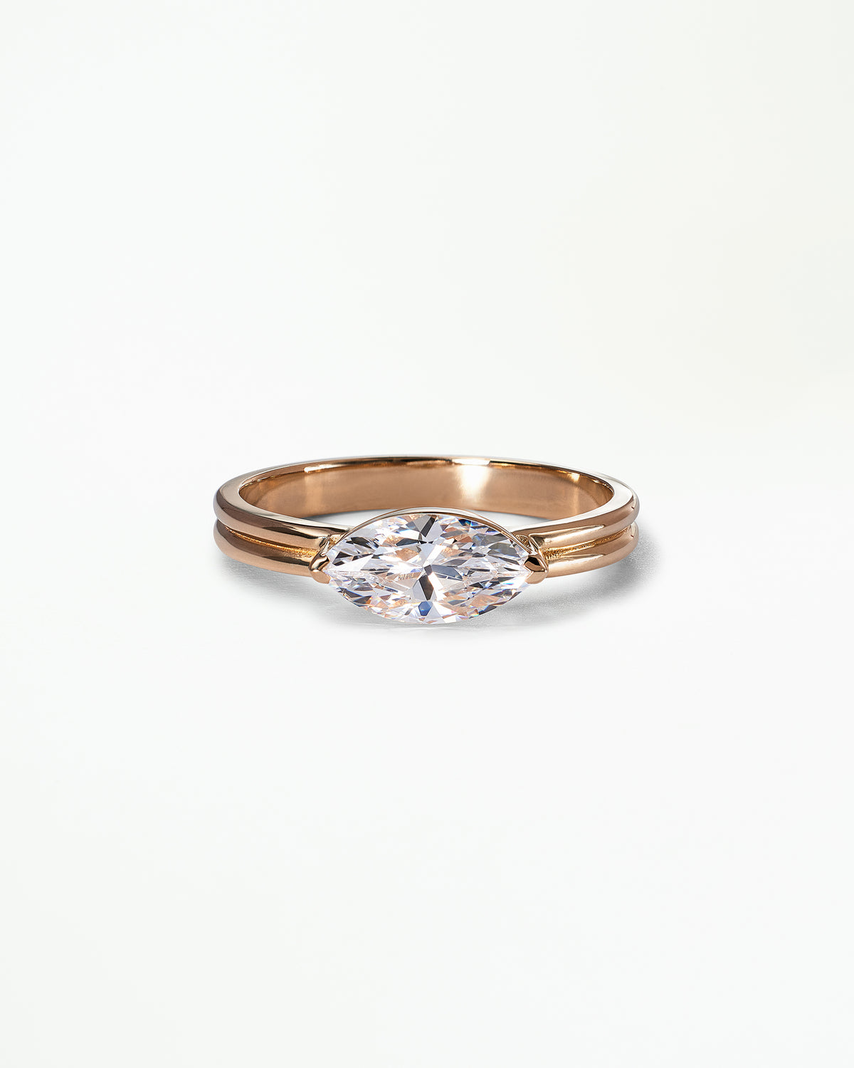[lifestyle]Marquise Cut Diamond Ridge Solitaire Ring