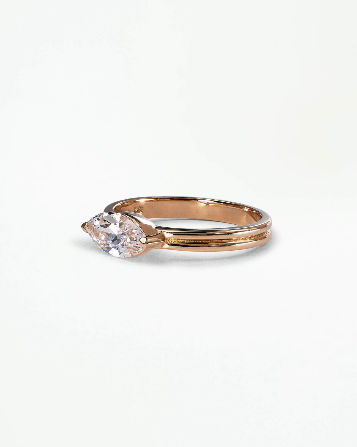 [lifestyle]Marquise Cut Diamond Ridge Solitaire Ring