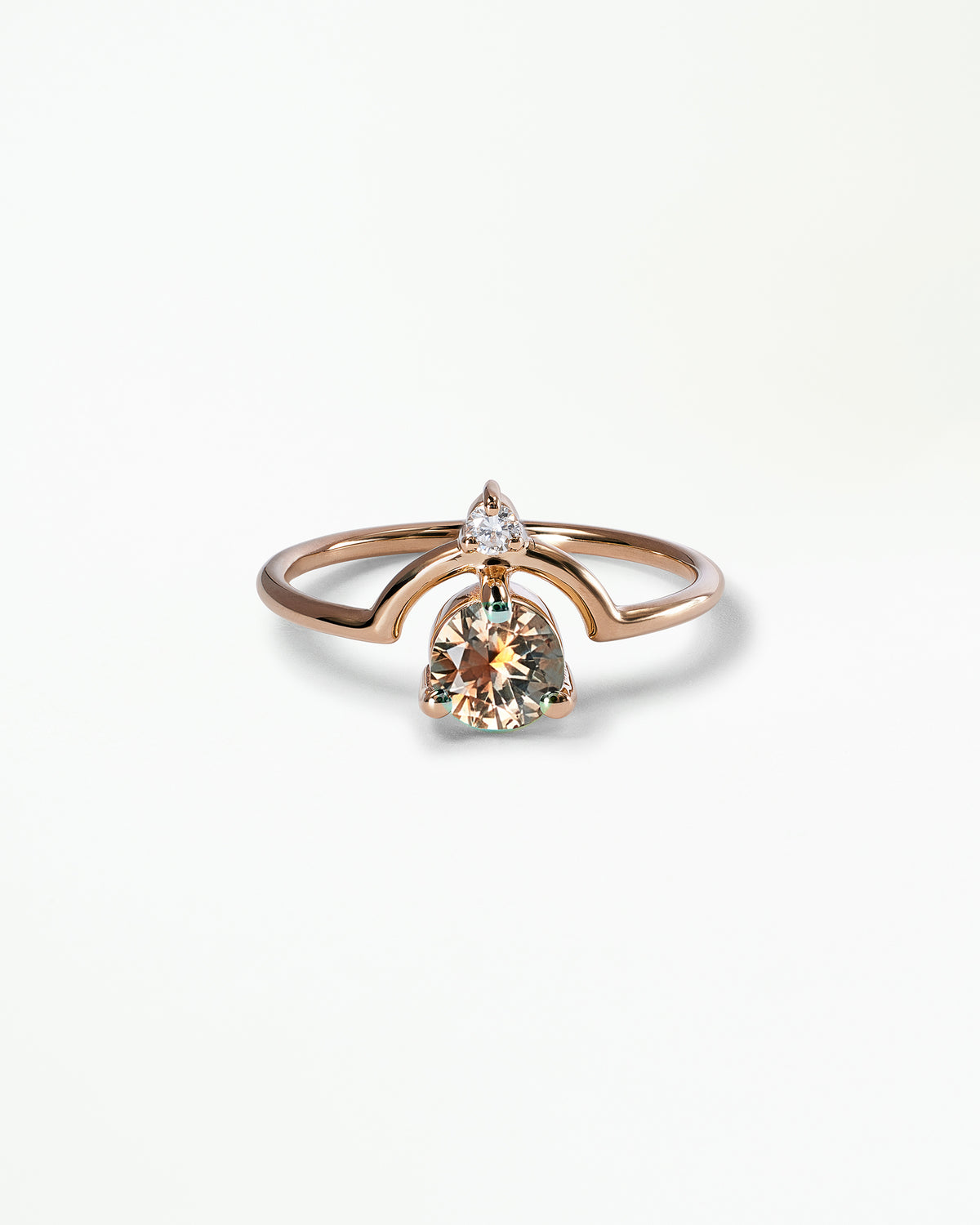 Medium Round Cut Sapphire and Diamond Nestled Ring