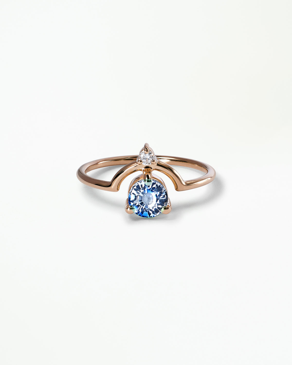 Medium Round Cut Sapphire and Diamond Nestled Ring