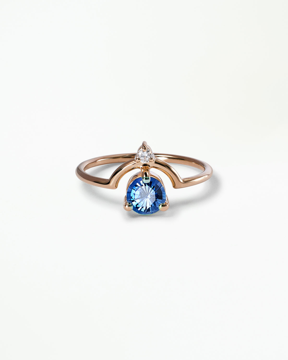 Medium Round Cut Sapphire and Diamond Nestled Ring