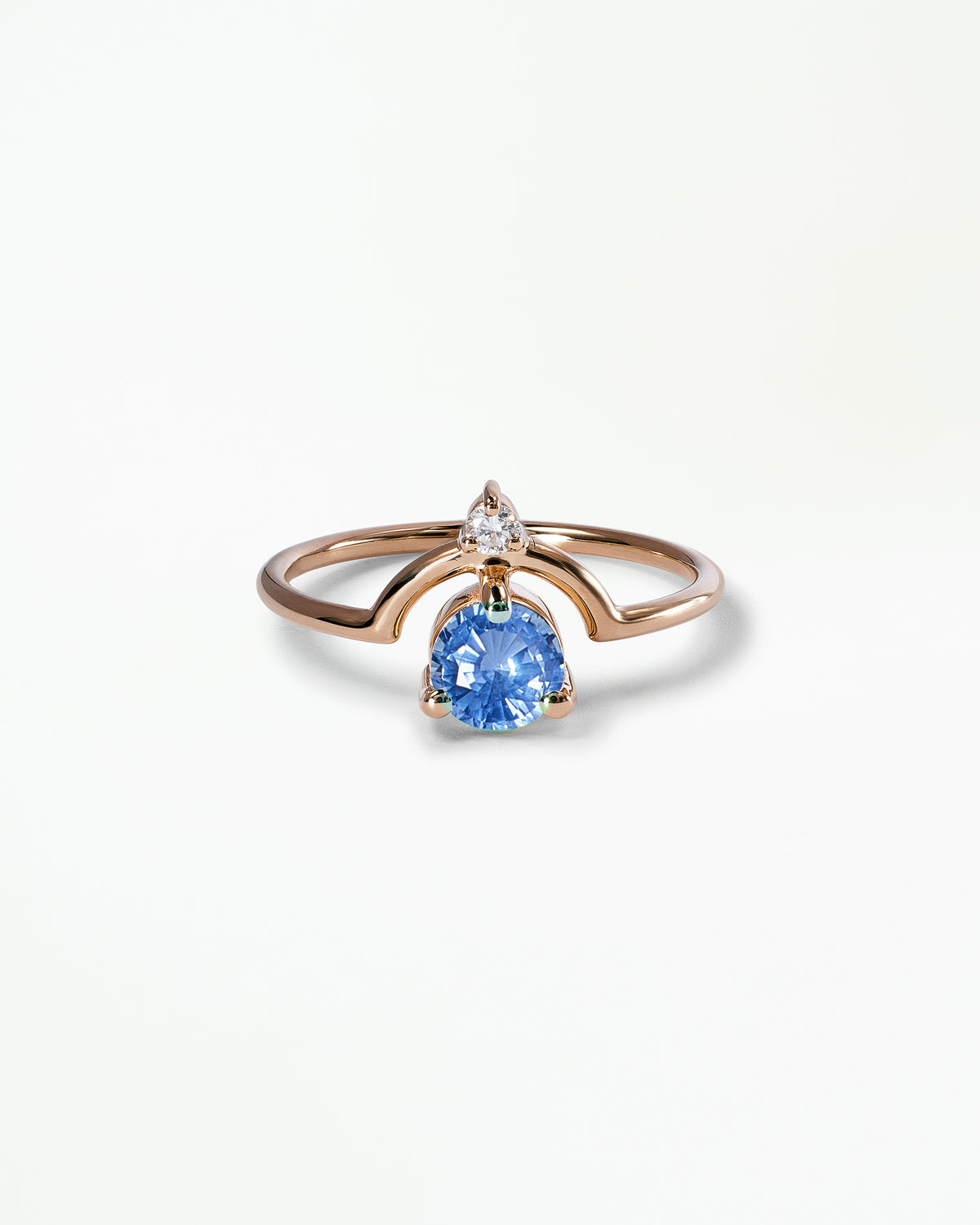 Medium Round Cut Sapphire and Diamond Nestled Ring