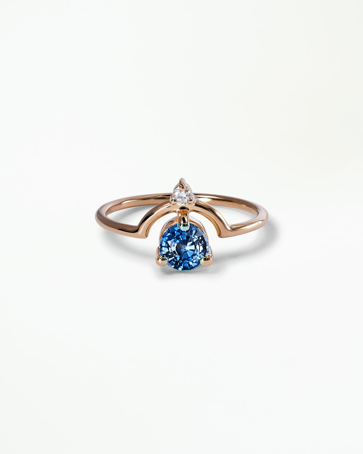 Medium Round Cut Sapphire and Diamond Nestled Ring