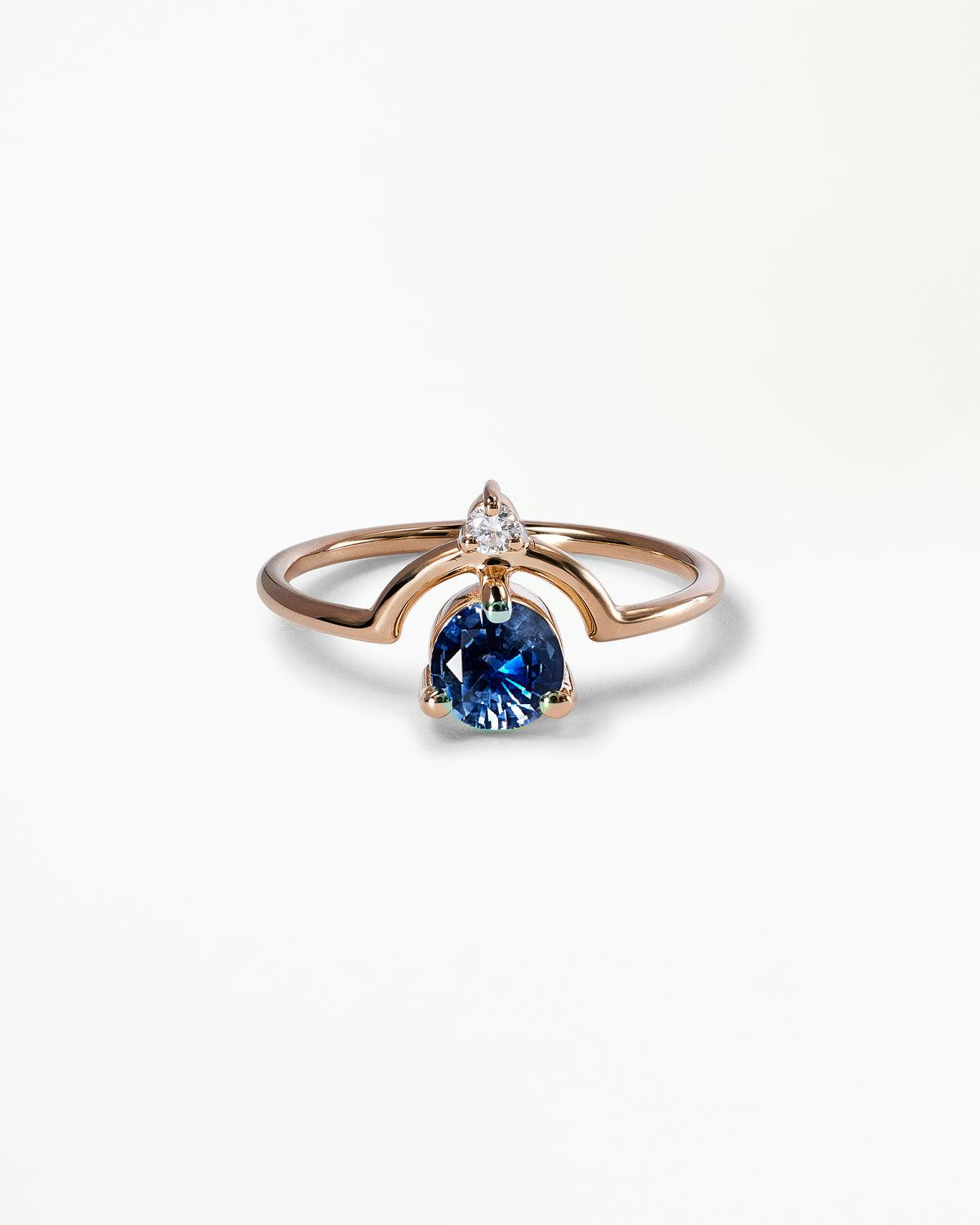Medium Round Cut Sapphire and Diamond Nestled Ring