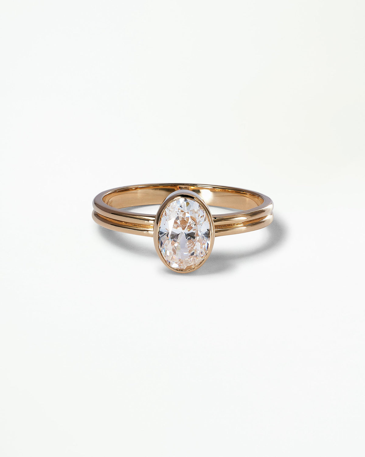 [lifestyle]Oval Brilliant Cut Diamond Ridge Solitaire Ring