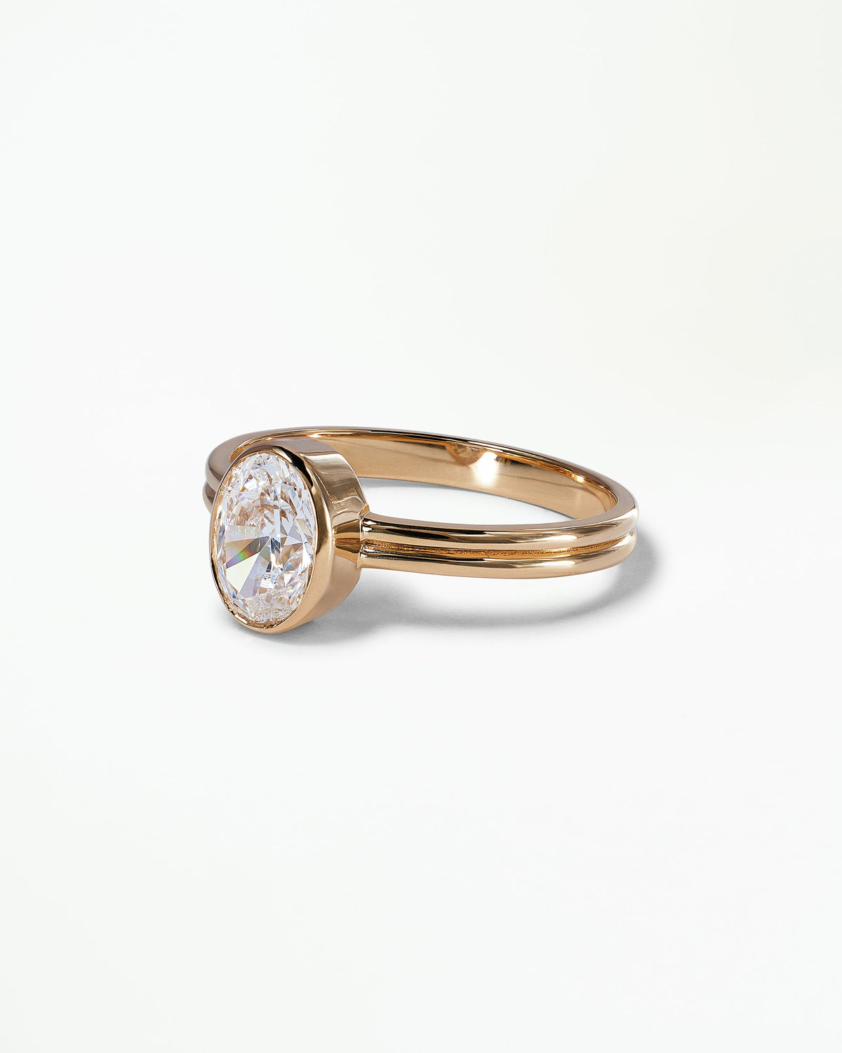 [lifestyle]Oval Brilliant Cut Diamond Ridge Solitaire Ring