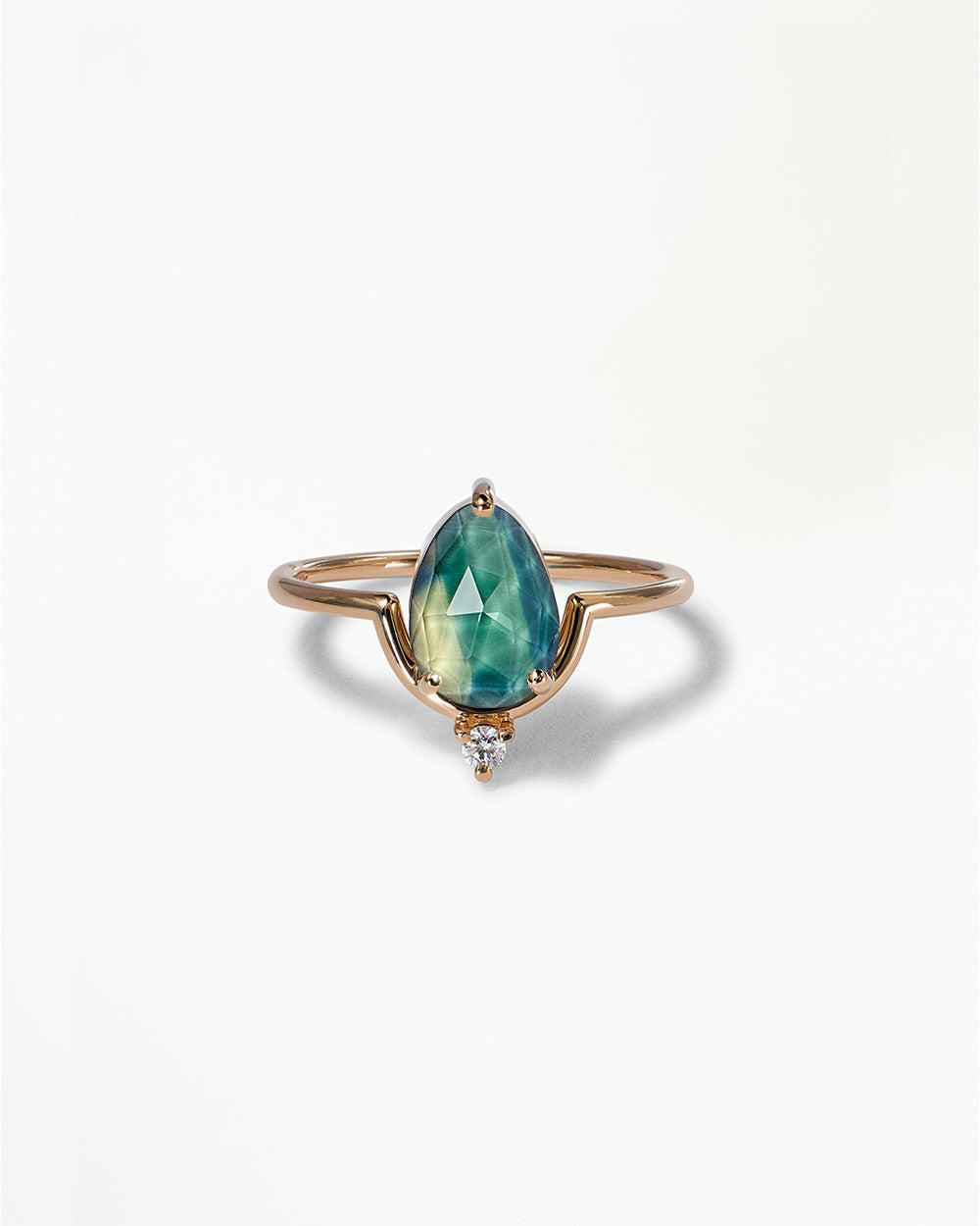Pear Cut Sapphire Nestled Ring
