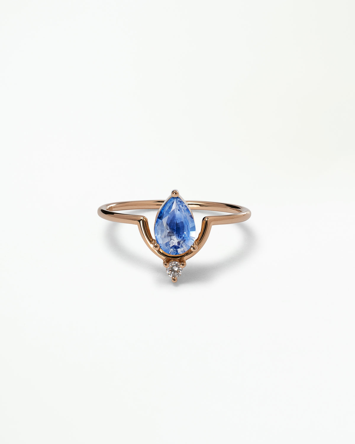 Pear Cut Sapphire Nestled Ring