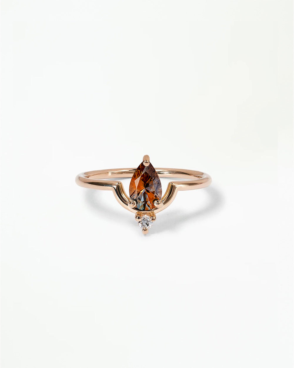 Pear Cut Sapphire Nestled Ring