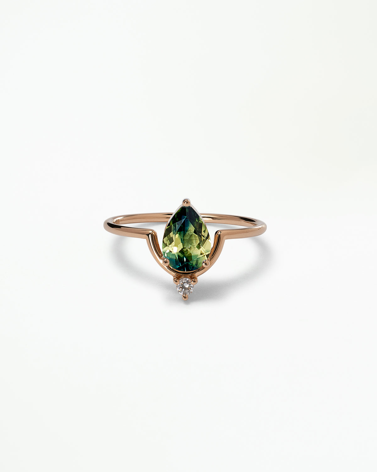 Pear Cut Sapphire Nestled Ring