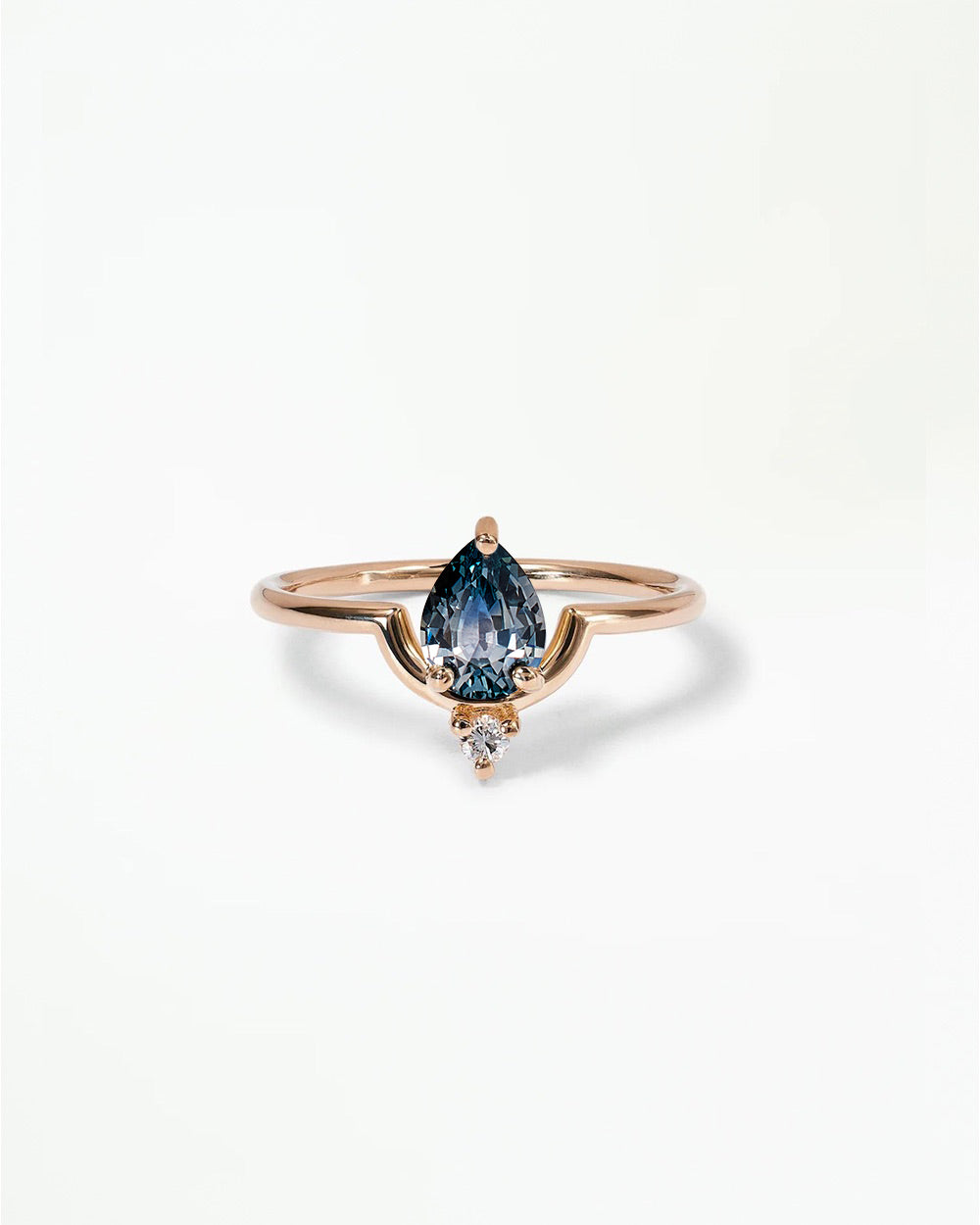 Pear Cut Sapphire Nestled Ring