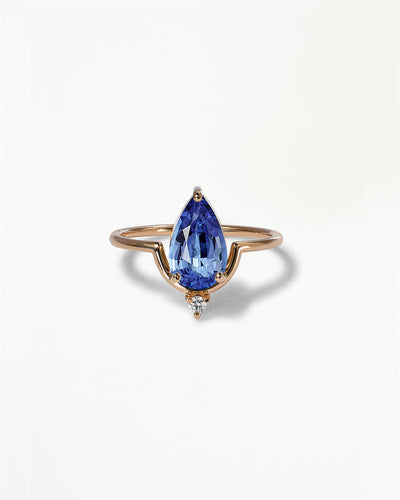 Pear Cut Sapphire Nestled Ring
