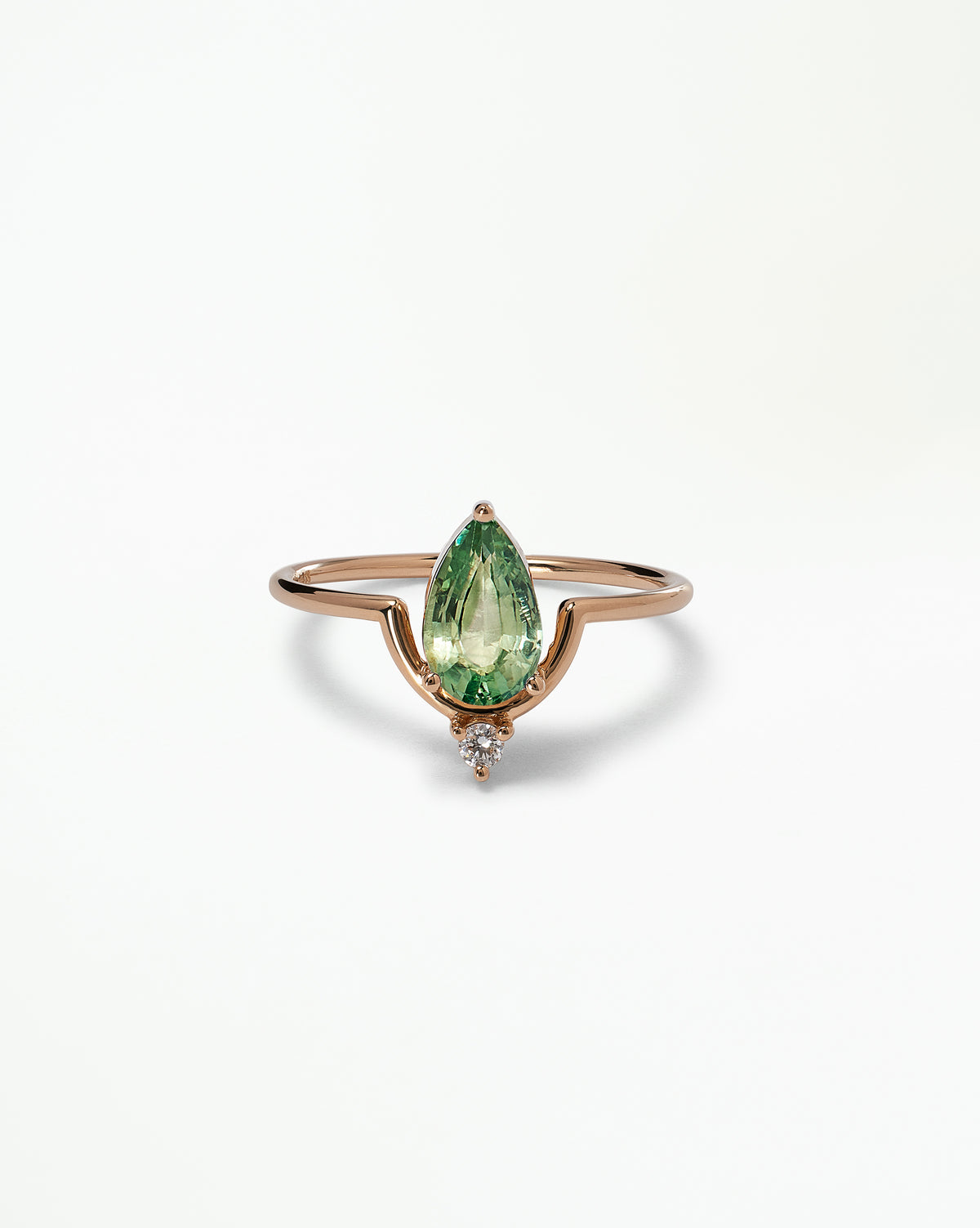 Pear Cut Sapphire Nestled Ring