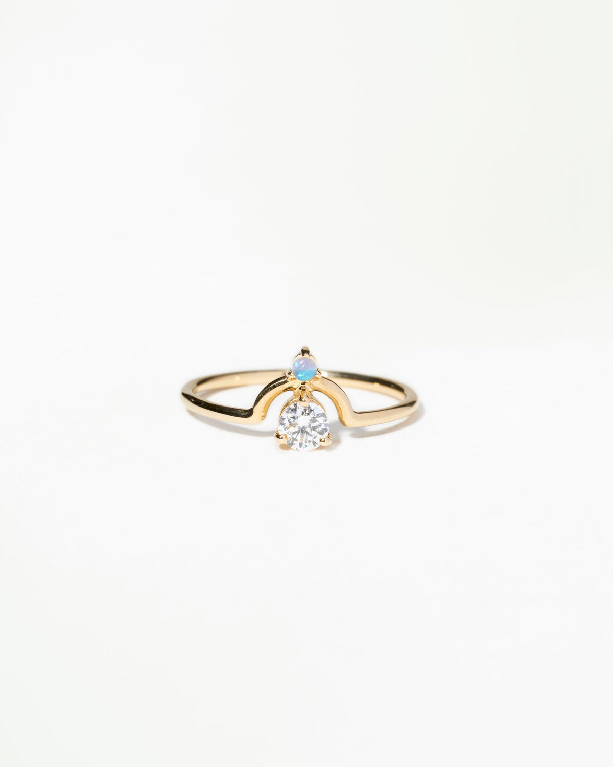 Small Round Cut Diamond and Opal Nestled Ring